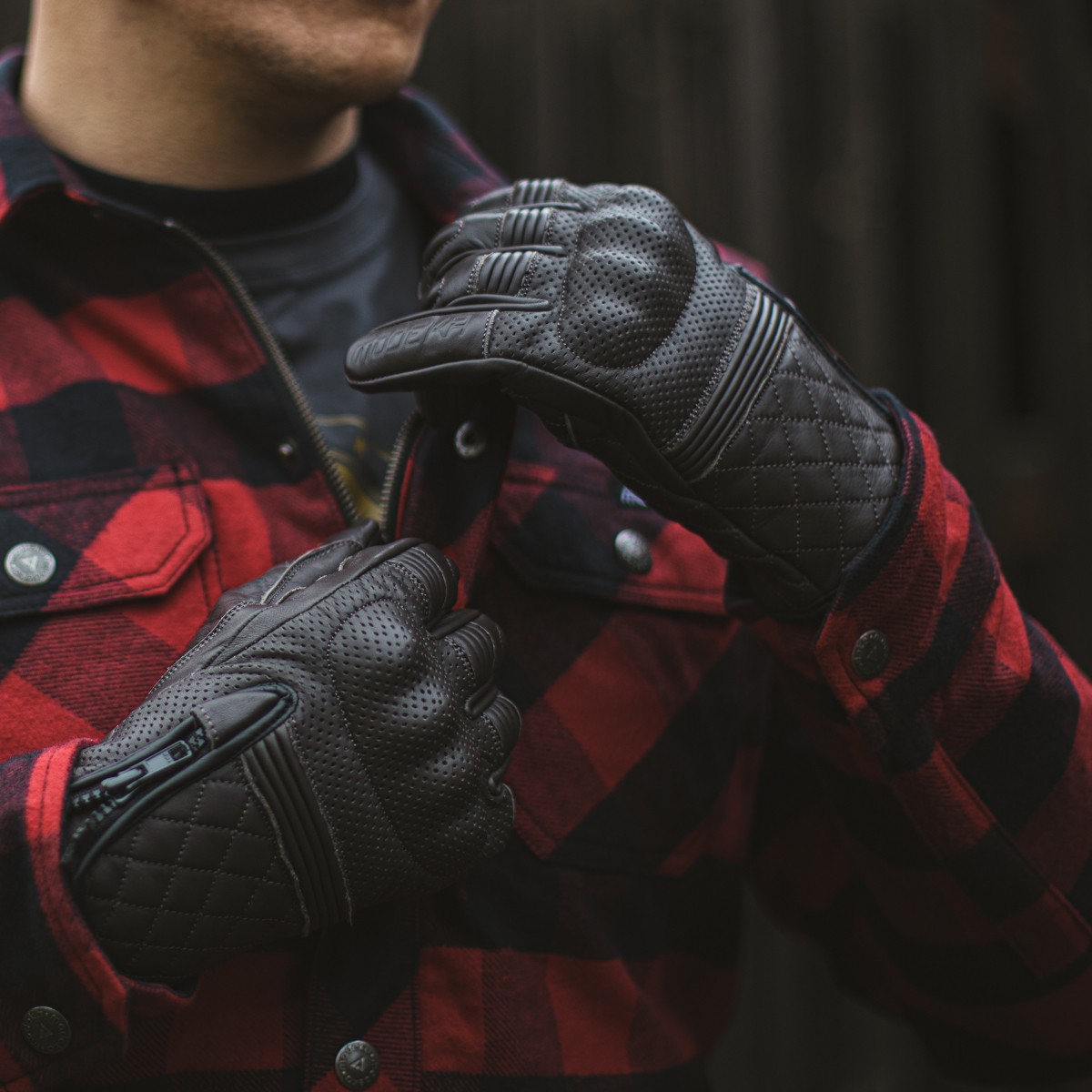 Motorcyclist wearing Parkar gloves