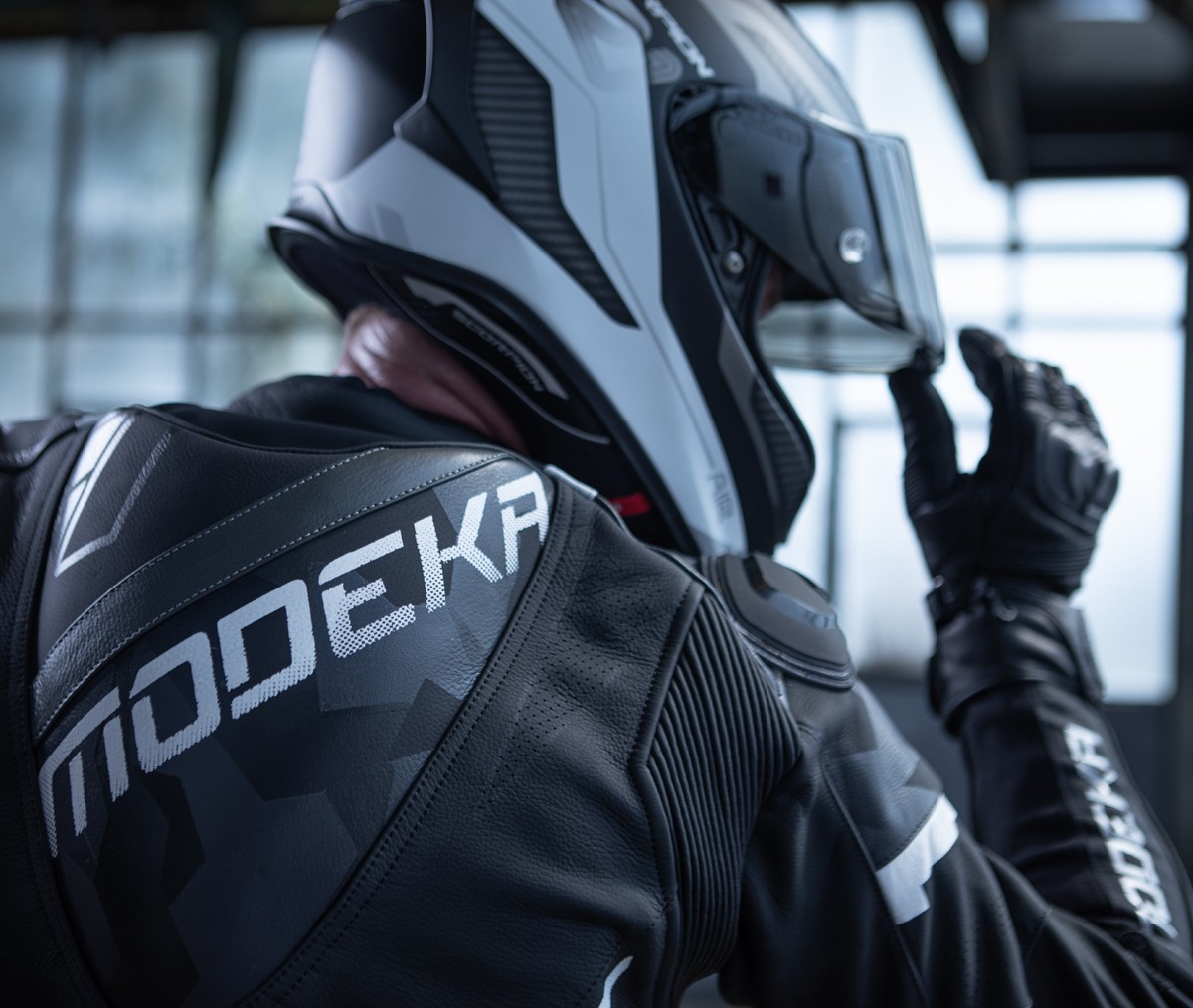 Close-up of a motorcyclist wearing a helmet