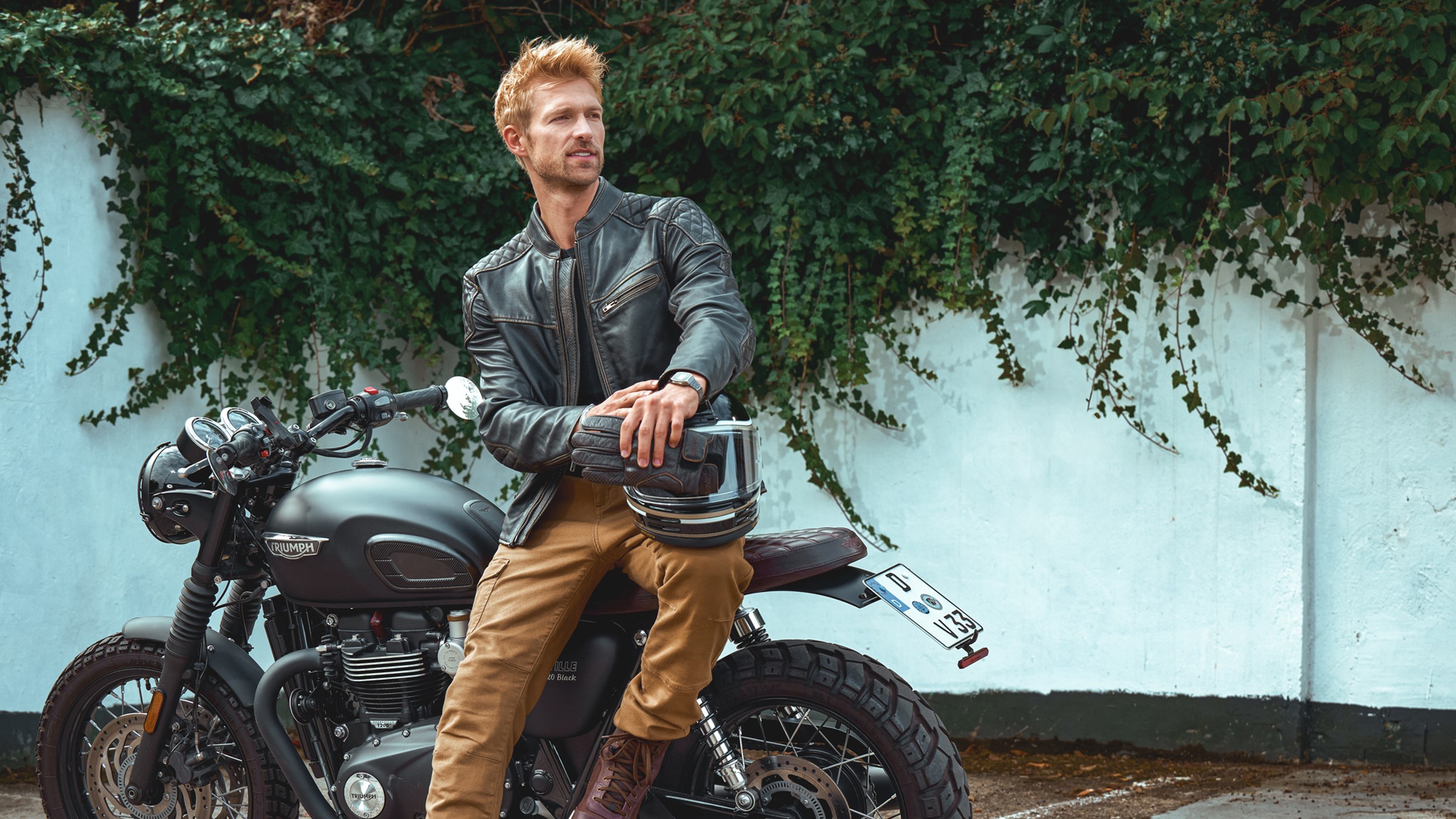 Motorcyclist sitting on a motorbike