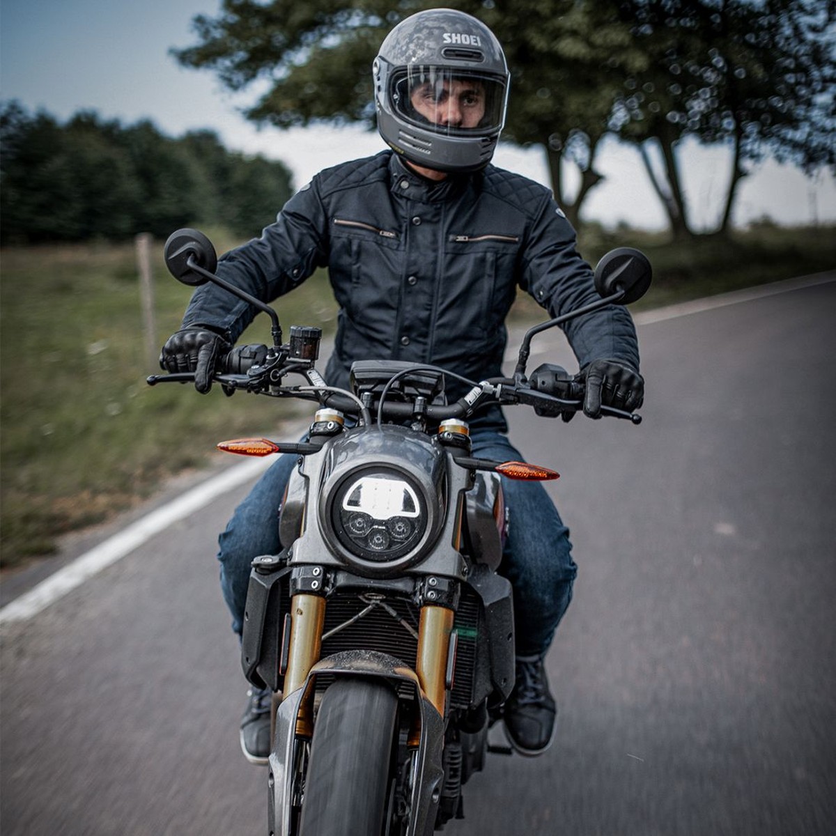 Motorcyclist wearing a Thiago jacket